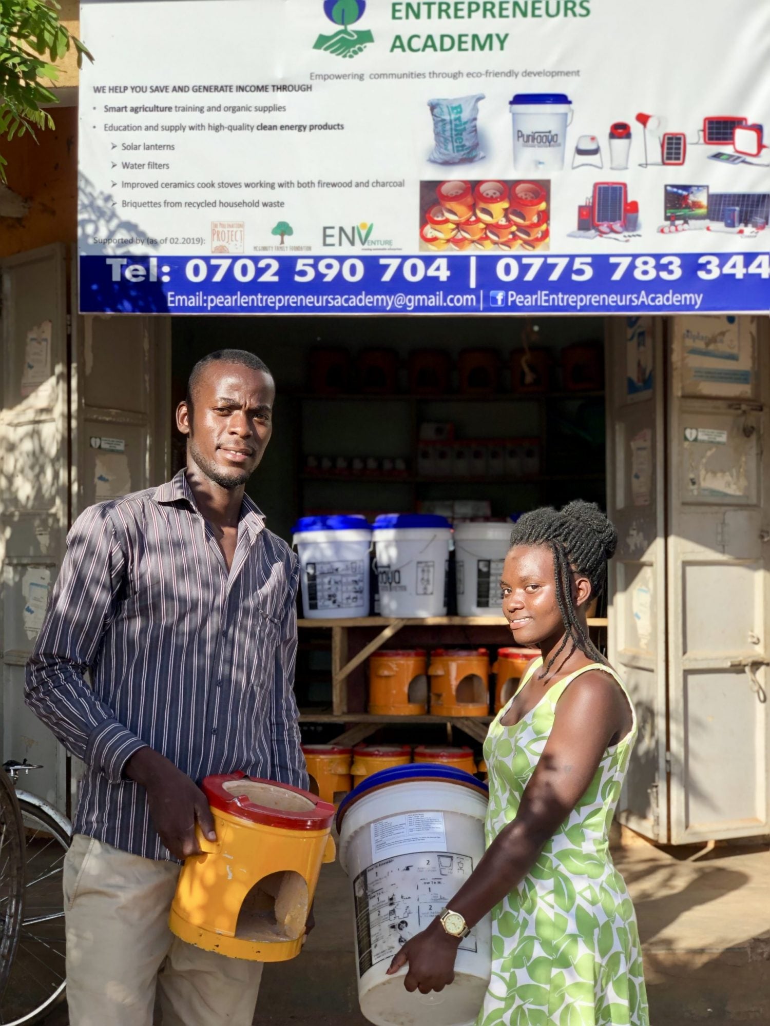 Elvis, an incubatee of New Energy Nexus stands infront of his clean energy enterprise