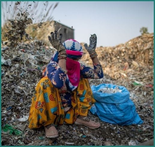 Waste Pickers In Muzaffarnagar Sift Through Mounds Of Plastic Trash For Metal Cans Or Or Intact Plastic Bottles That Could Be Sold, While Children Look For Discarded Toys. Photographer Prashanth Courtesy of Bloomberg.
