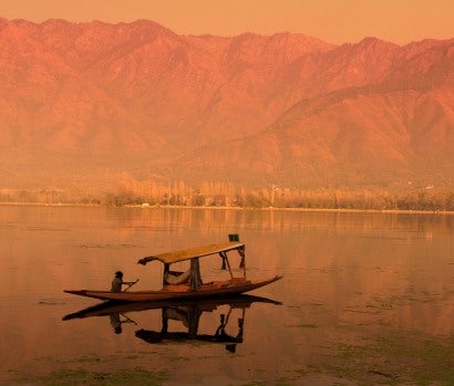 Sunset Dal Lake in Srinagar, Kashmir, India. Photo by yuliang11 from Getty Images, via Canva