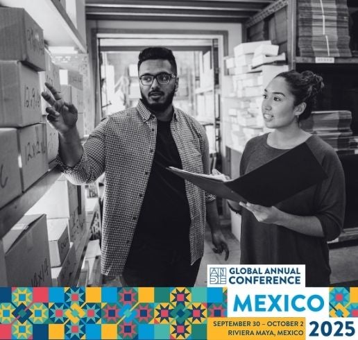 Entrepreneurs reviewing inventory. ANDE Global Annual Conference 2025