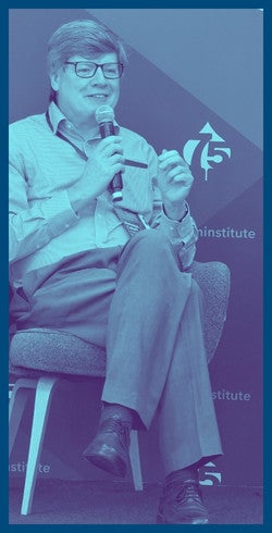 Nicolas Coloff image sitting, picture under a blue filter